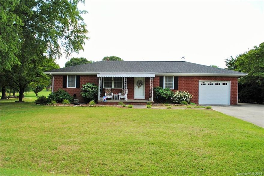 Well maintained 3 bed/1 bath brick ranch on a nice lot in a quiet neighborhood. Desirable East Rowan schools. Open kitchen/ dining. Beautiful hardwood and tile floors. Wainscoting& crown molding. New architectural roof in 2011, new HVAC in 2009. 3 garages! Single car attached, double car detached & 14x34 camper garage. Fenced in backyard. Mature trees. 16x16 screened deck in back. New insulated garage door & motor, new water heater. Make an appointment today. It won't last long!