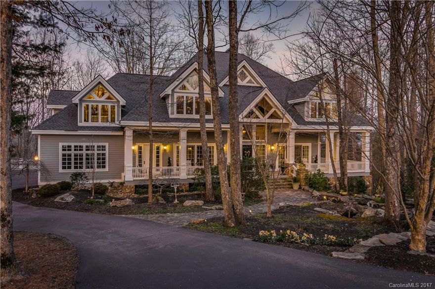 Masterfully crafted home situated on the third hole inside the country club community of Champion Hills. Features include enviable long-range mountain views, two-story great room, gourmet kitchen with granite counter tops and butler's pantry, formal dining room, five fireplaces, master suites on the main and upper levels, loft with offices and wet bar, pub and entertainment area on the lower level. Meticulously landscaped grounds with multi-tiered waterfall and koi pond, all on almost 3 acres.