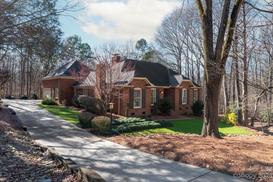 Welcome to your new Quail View home nestled on a tranquil cul-de-sac lot! Full brick ranch sits on a private .7-acre lot with a floor plan that's inviting & functional. Upon entry, the formal dining room sets the stage for intimate gathering, while the warmth of two working fireplaces creates exceptional ambiance. Work or unwind in the study for business calls or quiet reading. Centrally located kitchen has SS appliances, ample counter space, and a light, airy atmosphere. Great rm features a wood-burning fireplace, built-ins, wet bar, wine fridge & motorized blinds. Prewired speakers in the great rm, dining, study and on the patio make entertaining a breeze. Primary BR on main offers a luxurious ensuite bath & walk-in closet. 4th BR on the opposite side of home makes hosting guests a delight. Upstairs bonus room provides even more flexibility. Step outside to the manicured yard with a stone patio. Fenced backyard overlooks an expansive green space behind. All minutes from SouthPark!