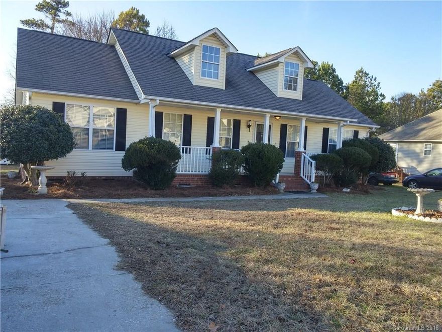 Gorgeous front porch ranch style 3 bedrooms, 2 full baths home is ready to move in.  Vaulted ceiling Family room with cozy fireplace.  New carpet, fresh neutral paint, kitchen granite counter top, back splash, tile flooring with stainless steel appliances.  Master suite offer trey ceiling, walk in closet, and double vanities.  Large back yard with work shop, deck, and lot of space for family activities.  This property won't last long.