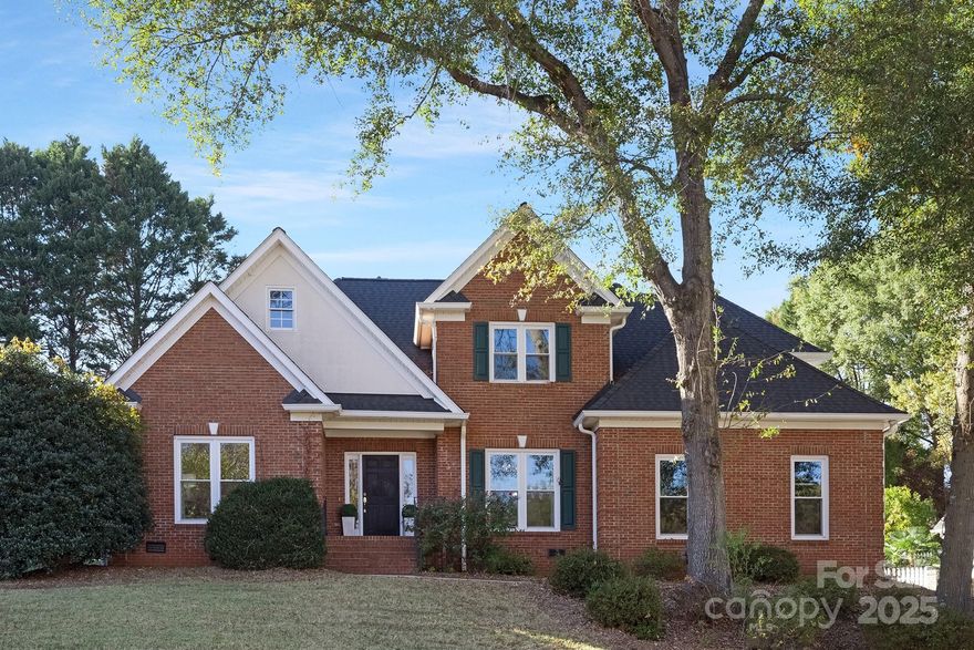 Welcome home to timeless charm in the sought-after Bailiwyck community! Freshly painted throughout, this beautiful home blends classic elegance with everyday comfort—and offers the opportunity to make it your own. The main-level primary suite adds convenience, while upstairs features three spacious bedrooms & two full bathrooms. Enjoy the eat-in kitchen, featuring a center island, breakfast bar, and pantry—perfect for casual meals and entertaining. Host guests in the formal living and dining rooms or relax in the cozy family room with a fireplace. From the den, step onto the screened porch or large patio—ideal for outdoor living. Gleaming hardwoods flow throughout, and the welcoming foyer sets the tone from the start. A side-load garage and mature trees add to the curb appeal of this lovely home, nestled in one of the area’s most desirable and established neighborhoods. Don’t miss the chance to make it yours!