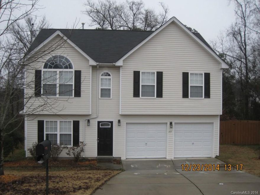 Awesome 4 bedroom / 2.5 bath house just outside of Rock Hill, SC! Fully equipped kitchen w/ breakfast area. Formal dining room w/ custom moldings.  Spacious family room w/ gas logs fireplace. Huge master suite w/ dual walk-in closets, trey ceiling & full private bath w/ dual vanities, garden tub & separate shower. 3 additional bedrooms all w/ vaulted ceilings, ceiling fans and ample closet space. Rear patio overlooking fenced in back yard.