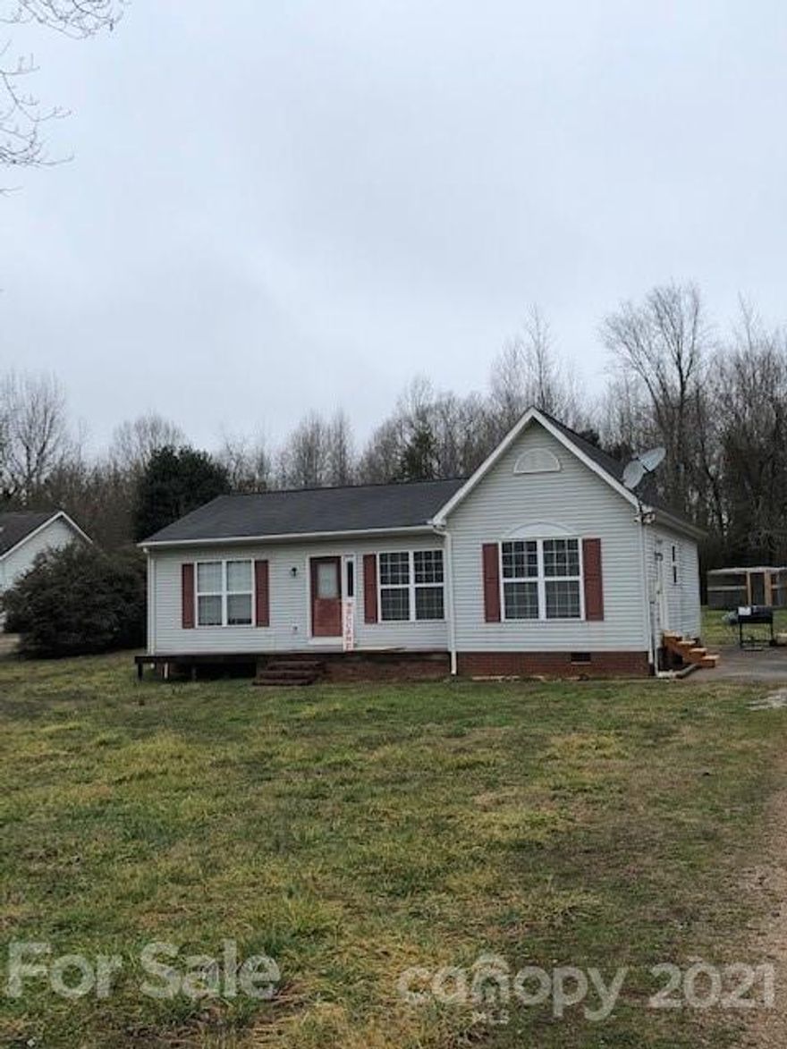 Back on market without inspections or anything done, no fault of seller. Custom modular home on 1 acre! Neutral paint throughout, professionally cleaned. Master suite has attached bathroom with walk in closet, dual sinks. Good sized second and third bedrooms share a hall bath. 
Laminate wood flooring throughout the home, no carpet anywhere! Water heater installed 2020, new ductwork for HVAC installed 2020, gutters replaced 2020 including a leaf guard installed with a transferrable warranty, new light fixtures, new blinds throughout, electric dog fence installed, new Honeywell thermostat! Home sold AS-IS!