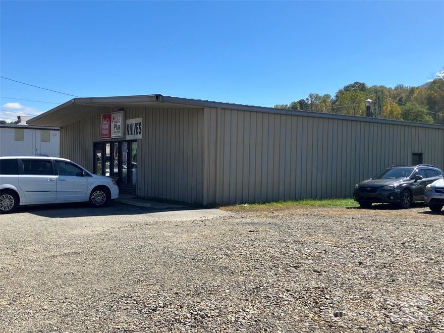 5000 SF Warehouse, retail and/or office location with road frontage on both Hwy 19E and E. Main Street in Burnsville. The property is currently occupied by an auto parts store. There was no water in the building or flood damage to the property after Hurricane Helene. The seller is open to owner financing and terms are subject to the details of any offer to purchase.
