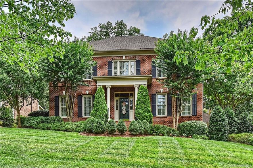Beautifully designed Georgian built by Simonini in the heart of Myers Park.  Spac reception foyer flanked by fmls.  Den w built-in cab, FP, & doors to access scrned porch w stone FP &TV. Renov. kit w BI frig & SS appliances. Butler's pantry. Rec rm off the kit. Side door has drop zone and leads to back stairs. 2nd FLR Mstr ste, w/ren, lux bth +4 bedrms & baths. 3rd FLR med rm  has wet bar and BTH. Addit 1200 heated SF plus 2 car garage w separate storage room added in 2008. Move in condition!!
