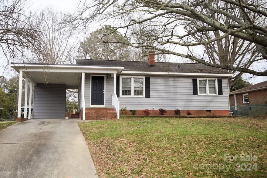 Nestled on Eleventh! This charming, 3-bedroom, 1-bathroom, vinyl siding, ranch style home conveniently located minutes from growing, downtown Albemarle, may be just what you are searching for!  Within the last year, owner has replaced hot water heater, refrigerator, and microwave. HVAC system replaced in 2018.   Attached carport with storage area, open backyard with beautiful concrete space, perfect for entertaining.