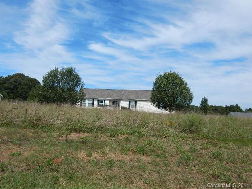 Located on a lerge lot.  Outbuilding, Deck.  Large bedroom.