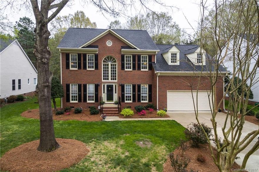 Fantastic FULL brick home walking distance to Blakeney retail and restaurants. Best schools in Ballantyne. This cul-de-sac lot backs to greenway and is very private. 20x12 screen porch adds to the sanctuary of your own retreat.  Bedroom number four on main currently used as an office but has original closet alcove which could easily be framed in. Encapsulated crawl. New roof in 2009 and new HVAC in 2010. Kitchen has upgraded granite throughout. Hardwoods throughout main floor. Do not miss!