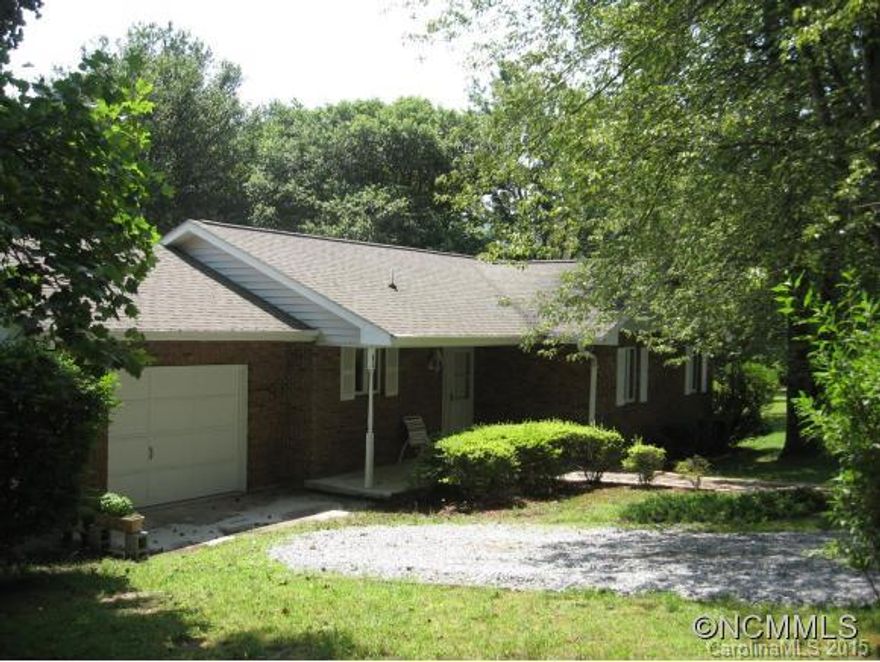 3 Bedroom-2 Bathroom, well maintained one level home conveniently located five minutes from town, features a beautiful back yard complete with tree house, great use of space, rear screened porch, very functional kitchen and easy maintenance brick and vinyl exterior.