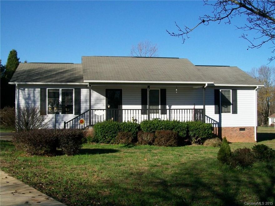 Charming ranch home in the country. Nice neighborhood. 3 Bedroom 2 Bath. Covered front porch, deck and storage building in large back yard