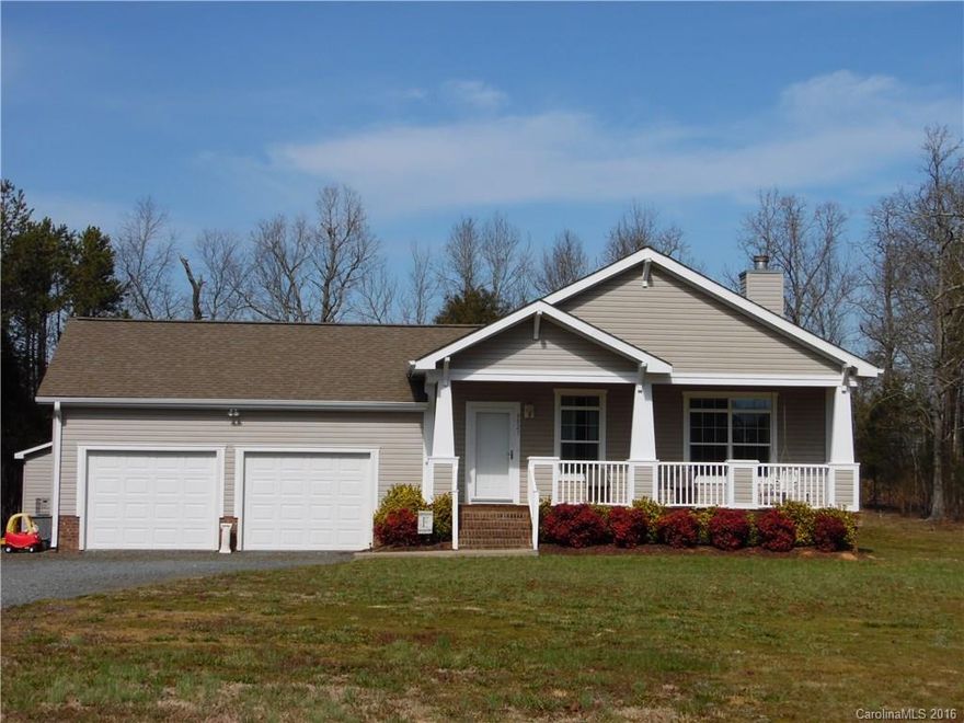 Almost like-new 2 bedroom, 2 bath home in the countryside of Cabarrus County. All one level, almost 3 acres, covered front porch, open kitchen/dining, double car garage. All major appliances convey. Priced to sell.