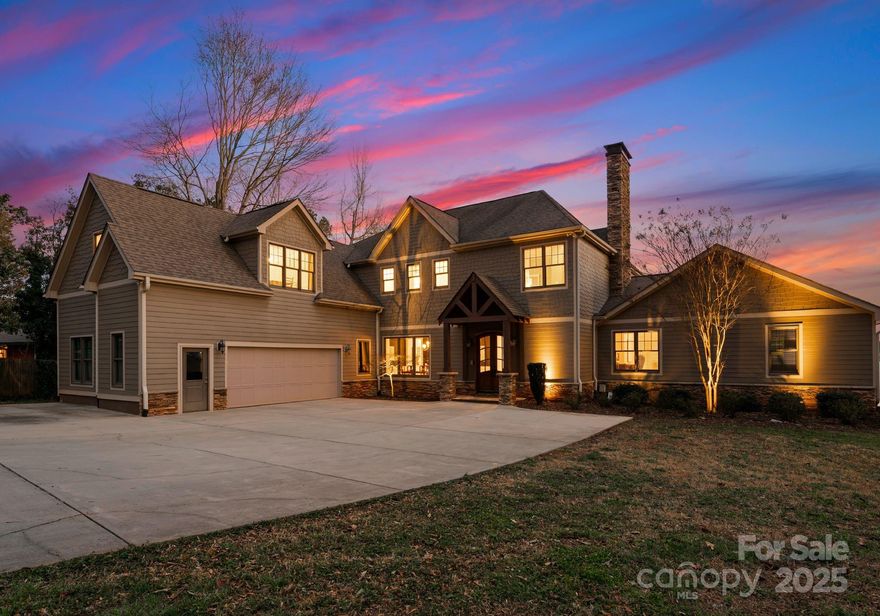 Stunning Lakefront Home – Lake Norman
This prime waterfront property sits on a cul-de-sac peninsula with 220+ ft of shoreline, a dock, boat lift, and rare boathouse with launch! Enjoy breathtaking south-facing lake views through soaring windows in the great room. The gourmet kitchen features an expansive island, perfect for entertaining. The main-level primary suite offers stunning lake views, while the second floor boasts four bedrooms and a bonus room. The finished basement includes a rec room, bonus/bedroom, full bath, and family room.
Pool Potential! Property is suited for a custom pool, tying into the boathouse & boat ramp—see MLS renderings.
Ideal for a primary home or short-term rental investment. Floorplan & details attached.
Schedule your showing today!