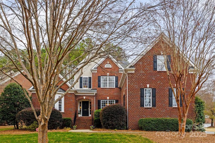 Capture the timeless elegance of this beautiful home nestled within the prestigious Palisades community. Soaring 2 story foyer entry showcases stunning architectural features. Designer accents display intricate molding & arched doorways. Formal living room/study & dining room create charm & class. The inviting family gathering room with cozy fireplace adjoins the gourmet kitchen boasting modern upgrades..great for entertaining! Large prep island with bar seating- a wonderful feature! Breakfast room wall of windows provides an abundance of natural light. Spacious primary on main highlights a gorgeous spa like en suite. You’ll love the unique free standing soaking whirlpool! Upstairs features 3 bedrooms and 2 bonus rooms. One bonus be a 5th bedroom with a large walk in closet+ attic storage galore!  The 2nd, an oversized recreation/media/playroom equipped with cabinets & refreshment center complete with a fridge. Breakfast room & primary suite french doors lead to the awesome screened porch.. a perfect retreat for lounging while enjoying the ambient stone fireplace as you embrace the serenity of nature’s beauty. Surround sound on the porch & main level also add a special touch. Upgraded trex porch/deck flooring. Tranquil wooded landscape is accentuated by a meandering flagstone path with a private hidden deck. Resort-style living amenities -Jack Nicklaus golf course, community pool, club house, playground, walking trails++! Welcome Home!