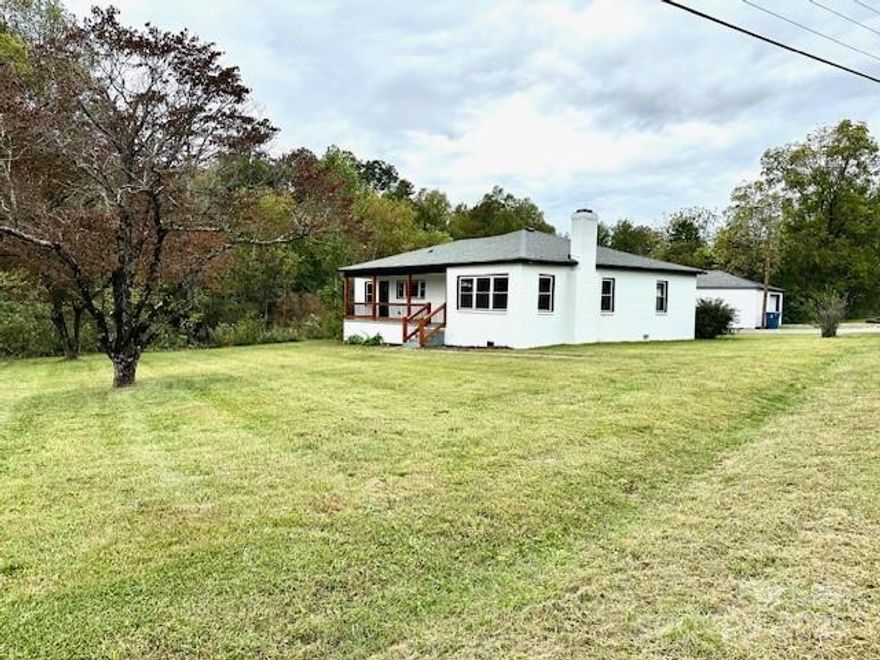 TAKE ANOTHER LOOK....Fantastic value in this remodeled full brick ranch with 1.70 ACRES outside of city limits. Seller may assist with CLOSING COST with acceptable offer. This home offers great proximity to Morganton/Lenoir. Features an open floor plan with 3 bedrooms/2 full baths. Upon entry note the beautiful REAL hardwoods, fireplace, and high-end NEW kitchen. This kitchen boasts NEW custom cabinets, quartz counters, tile backsplash and SS appliances. Off the kitchen you have a large laundry room with plentiful storage space. Even better, both bathrooms have also been remodeled with stylish tile, quartz, and new cabinetry. One of the 3 bedrooms offers entrance from the covered front porch! More updates include brand new interior/exterior paint, light/plumbing fixtures, gutters, HVAC, windows, siding on garage, septic, refinished floor, plumbing/electrical upgrades, water heater, 30 year roof in 2021...turnkey! There is also a 576 sqft detached garage, covered front and back porch, and plenty of flat acreage to the back of the home for a pool or garden!