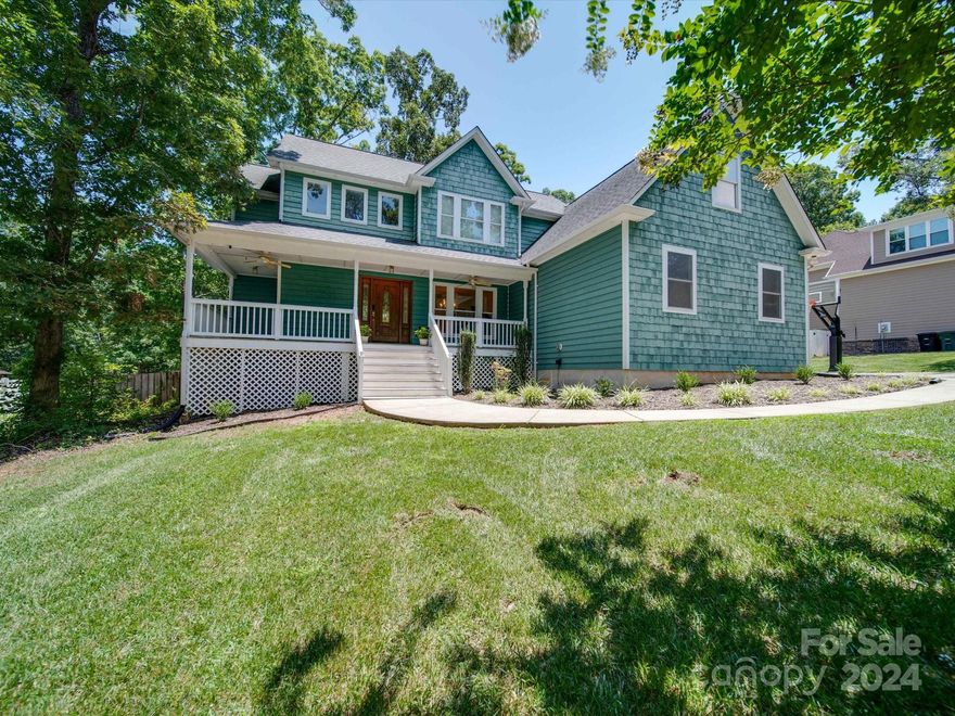 Discover the charm & tranquility of 2205 Carmel Oak Lane. This beautiful home is conveniently located just minutes from downtown Monroe, providing easy access to a wide range of restaurants & shops. A welcoming rocking chair front porch leads into the spacious entry area. The kitchen highlights custom cabinets, stainless appliances, & breakfast nook w/bay window that floods the space w/natural light. The living room boasts a gas log fireplace & french doors that open to an expansive rear deck, offering serene views of the wooded, fenced backyard. The main level primary suite includes a large corner jacuzzi tub, a separate shower, and dual sinks. Upstairs, you'll find 3 additional bedrooms with ample closet space, a full bathroom PLUS bonus room or 5th BR.  If you require more space, then check out the unfinished basement. With over 1,400 sqft it's the perfect workshop or for you to store all your toys! 50 Amp R/V hookup, fresh paint inside, new carpet upstairs, new HVAC unit upstairs!