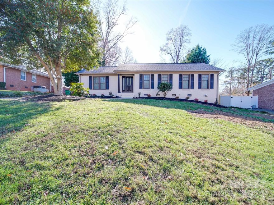Fully renovated home with IN-GROUND POOL on 0.43 ACRE LOT! This beauty is superbly located in the vibrant MORA district of Charlotte w parks, shops, & Uptown nearby. Move in ready w NEW 2023 roof, 2023 water heater, & 2023 HVAC. Upon entering, you are greeted w neutral freshly painted tones, crown molding, & new LVP floors throughout. The main living area features a gas fireplace, new lighting, & spacious family room opening to kitchen. Kitchen is complete w generous island, designer pendant lighting, all new cabinetry, granite countertops, disposal, backsplash, & all new ss appliances including refrigerator. Enjoy 3 well appointed bedrooms w the primary suite featuring an en-suite bathroom. The fully fenced backyard is the perfect retreat for hosting gatherings or enjoying quiet evenings overlooking the in-ground pool. NEW vapor barrier & insulation in crawl space. All updated windows! Welcome Home! SEE VIRTUAL WALKTHROUGH 3-D TOUR.