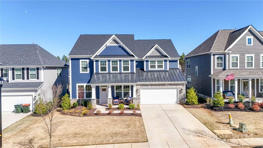 Welcome to this charming 5 bed/4 full bath home nestled in popular Paddlers Cove neighborhood just minutes from the shores of Lake Wylie! You'll find modern finishes throughout featuring open floorplan w/ hardwood floors, guest suite on main, home office, bright sunroom, huge butlers pantry & chef's kitchen that's sure to impress & satisfy all of your entertaining needs. Upstairs you have a spacious loft, 3 additional large bedrooms, & deluxe primary suite that features tray ceiling, ensuite bath w/ luxurious bathtub, tile shower, 2 sinks & his & her walk-in closets. Enjoy the SC weather by sitting out on back screened-in porch or on custom paver patio perfect for a firepit gathering. This sought-after area is renowned for its award-winning schools & low SC taxes. Residents have access to a wealth of community amenities including the clubhouse, playground, 2 community pools, field day park, pickleball courts & more. Discover lakeside living in this stunning home!