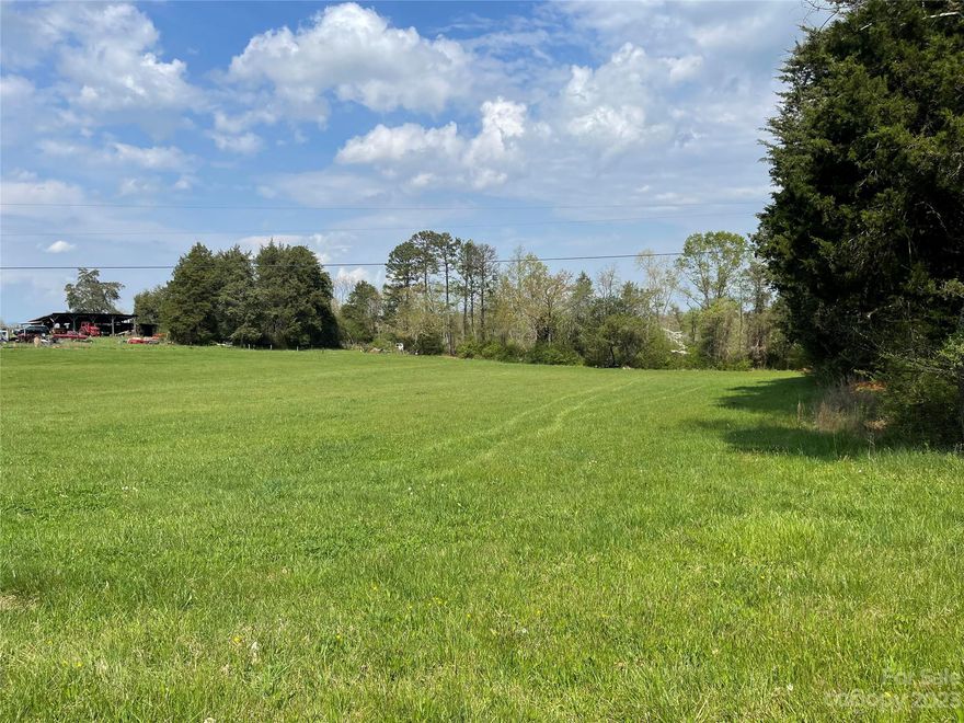 With a stream meandering through the property, a nice wooded area to hunt and play and plenty of tillable ground to farm, lease for income or make your own. This property boasts privacy but convenience to Statesville. Having paved road frontage on two sides of this property allows you to recreate one part with easy access and live on the other side. The property has an easement crossing it to access the property behind it; the gravel drive is well-maintained and not invasive to the rest of the property.