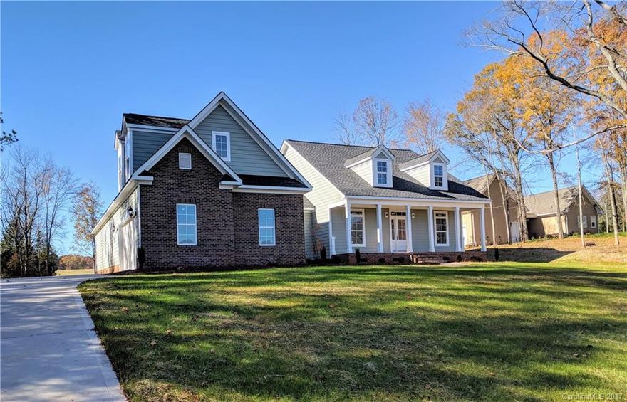 New construction home ranch with 4 bedrooms, 3 full baths with 325 sq ft bonus room.  Large kitchen with island and keeping room.  Vaulted ceiling in living room with fireplace.  Hardwoods in entry, living room, dinning and kitchen; baths and laundry has tile flooring and carpet in bedrooms.  Outside features include cement fiber siding, side load garage, covered front and rear patios. Seller will give allowance for buyer to choose paint colors, carpet & fixtures. Heavy crown molding throughout.