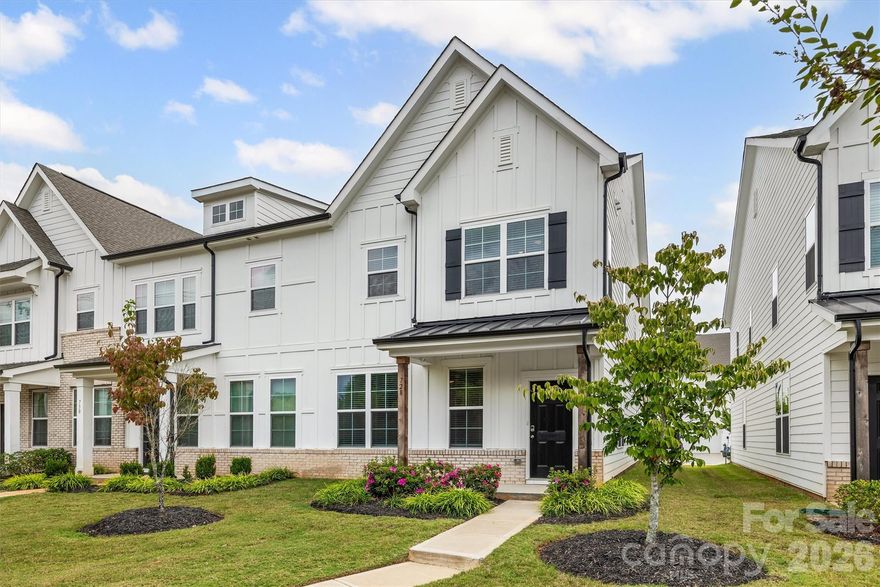 Welcome to this nearly new end-unit townhome in the desirable Auden community! Built in 2023, this home features an open floorplan with tall ceilings on both levels, creating a bright and spacious feel throughout. The open layout invites connection—whether you're cooking in the beautiful kitchen with granite counters and stainless appliances or relaxing in the spacious living area. Upstairs, the primary suite offers a peaceful retreat with a tray ceiling, tiled shower, and dual walk-in closets. Each bedroom provides generous space and storage, making the home as functional as it is comfortable. Designed for today’s lifestyle, it’s hardwired with Cat6 cables for lightning-fast internet, ideal for work or streaming. With a two-car attached garage, included refrigerator, washer, and dryer, and a location close to shopping, dining, and medical care—you can simply move in and start enjoying life.