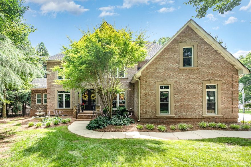 Experience unrivaled elegance in this custom-built Lake Norman waterfront estate in Mooresville offering breathtaking lake views and year-round deep water. Enter into an impressive foyer with soaring ceilings, setting the tone for this nearly 4,000 sq ft retreat featuring 4 bedrooms, 4.5 baths, a PRIVATE DOCK with gazebo & slide. The primary suite is a private oasis, with its own all-season room, spa-like bath, oversized custom closet & storage area. Additional all-season spaces offer serene lakeview lounging or the perfect work-from-home retreat. Inside, enjoy vaulted ceilings, a media room, and flex space ideal for a home gym.  Seller has spared no expense, with a professionally painted interior in a gorgeous neutral tone and kitchen featuring all cabinetry professionally painted, new backsplash & modern hardware. Recent upgrades include Pella windows (2025), HVAC, (2025) garage doors, tankless water heater (2023) & more! No HOA. Appraised over $2M. Luxury redefined on Lake Norman.