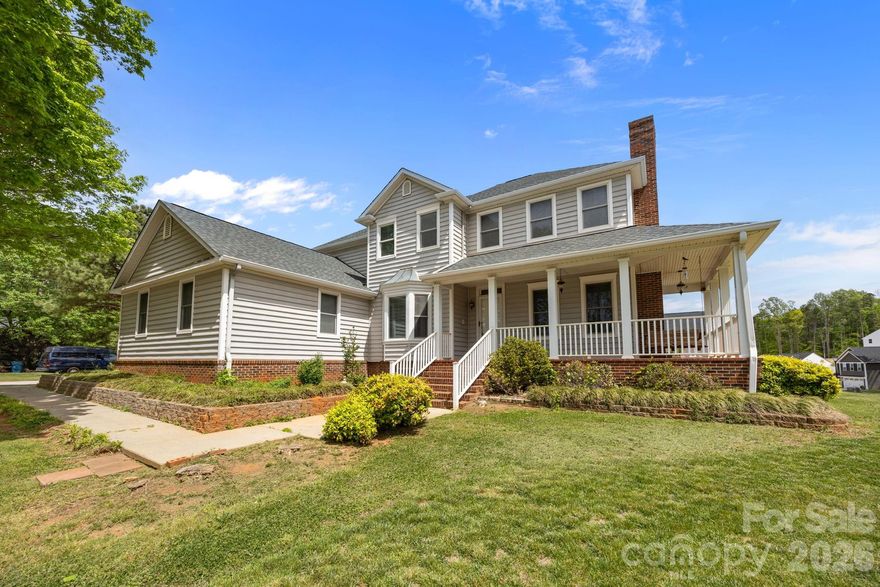 Beautifully Updated 2-Story Home with Full Basement, Expansive Porch & Prime Location!

Discover this meticulously maintained 2-story home, perfectly blending modern comfort with an unbeatable location—just 15 minutes from Uptown Charlotte, Charlotte Douglas International Airport, and Huntersville. Enjoy convenient access to the city while relishing the tranquility of a private, peaceful setting.

Modern Updates:
Newly refinished hardwood floors throughout the main living areas
Brand-new carpet in all bedrooms
Freshly painted interior throughout

Updated Kitchen:
Modern appliances, stylish sink, and faucet
Sleek countertops and abundant cabinet space, ideal for cooking and entertaining
Newly installed luxury vinyl plank (LVP) flooring for durability and style

Bright & Private:
All windows feature brand-new blinds for light control and privacy

Spacious Living Areas:
Expansive main living spaces perfect for hosting guests
Very spacious primary suite with spa-like bathroom and walk-in closet
Upstairs includes 3 additional bedrooms, 2 with walk-in closets, 2 full bathrooms, plus extra unfinished storage space

Outdoor Amenities:
Large corner lot with mature trees for natural shade and added privacy
Newly added greenery enhances coverage and curb appeal
Large covered front porch and spacious back deck, ideal for relaxing or entertaining

Full Basement:
Generous full basement with endless possibilities for additional living space, a home gym, or ample storage

Move-In Ready:
Whether hosting friends, enjoying your private outdoor spaces, or taking advantage of the home’s prime location, this home offers the perfect lifestyle.

Don’t miss the opportunity to own this beautifully updated home in a fantastic location!