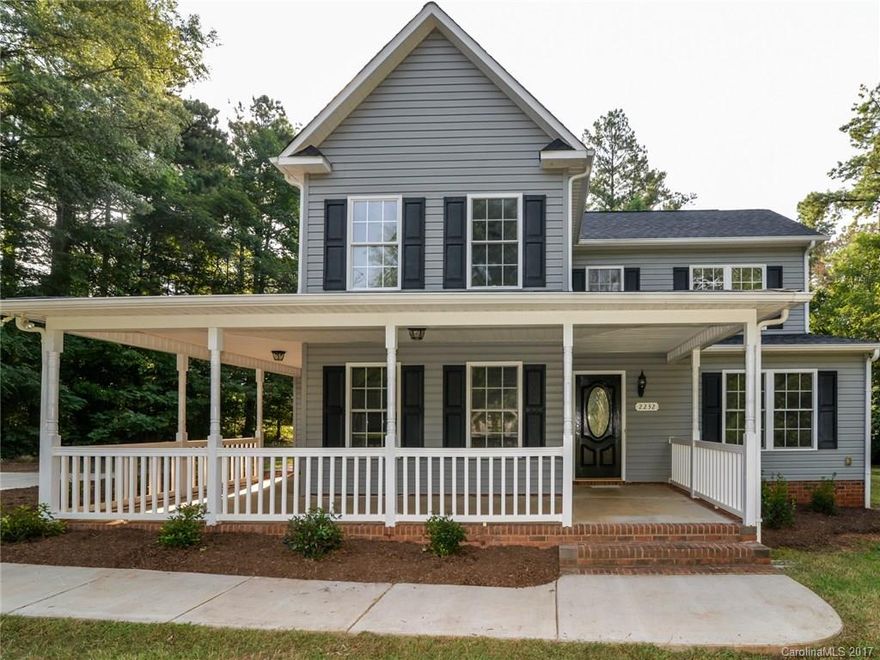 Country Livin' at it FINEST! AWESOME wrap-around porch to enjoy! Walk-into HUGE Great Room w/Gas Logs. Enjoy entertaining in your Formal Dining Room/or could be an office! Chefs Kitchen w/ White cabinets, Texas WT Granite, and NEW SS Appls! Beautiful new vinyl wood flooring accents the flooring in Kitchen, Breakfast & all Baths! MASTER on MAIN w/ HUGE walk-in closet! Luxury Master bath w/Jacuzzi tub-tile surround, sep shower! Up: 3 HUGE bedrooms all with double door closets! Lovely 1.0 acre LOT!