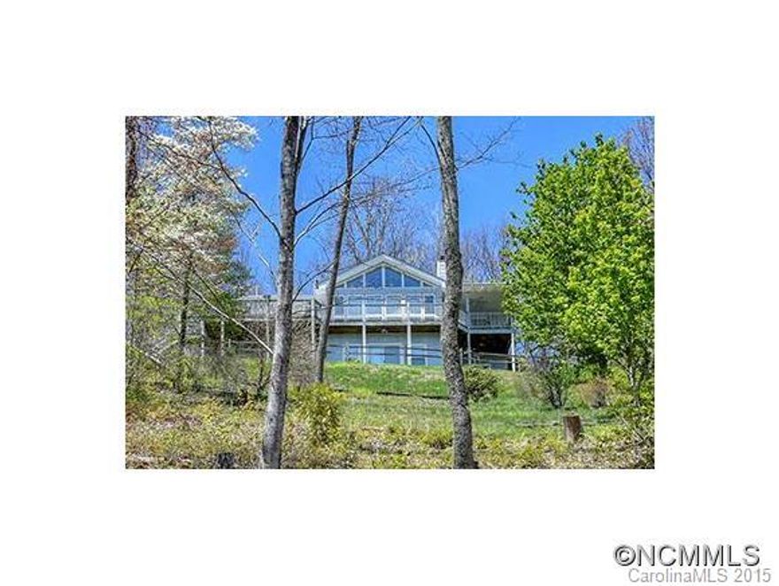 Oh, I'd love to live on a mountain top! One of the most spectacular, magnificent, unforgettable views in the mountains.  Home is perfectly situated with a SE exposure, thoughtfully designed and maintained lovingly. Ample room for family/guests with privacy for all. Spacious kitchen, hardwood flooring, 2 stone fireplaces.  Grounds belong on a magazine cover with something ever blooming.  A perfect mountain house, room to explore and enjoy.