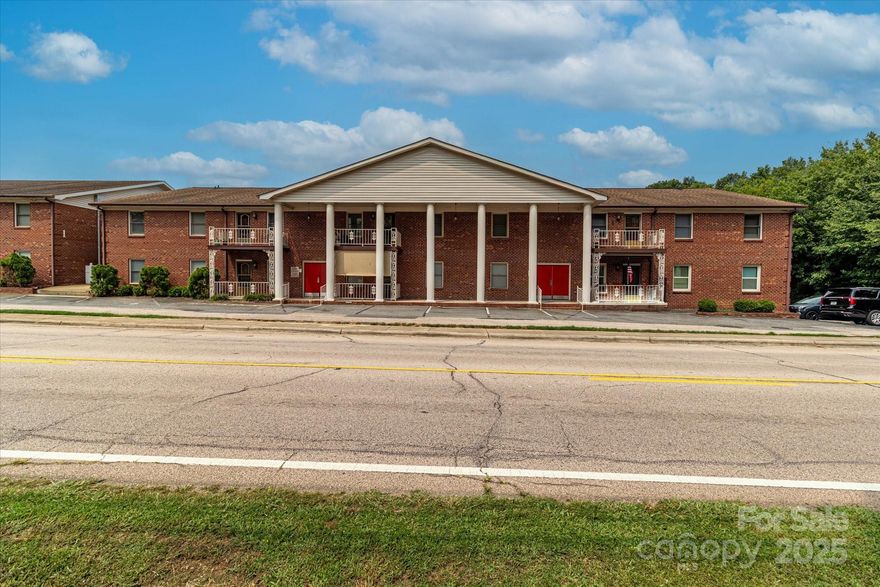 Classic, nostalgic charm is showcased in the Carriage House Condos! The buildings surround the spacious interior courtyard that features the pool and lots of well-maintained grass for your pleasure. Here's your chance to own a 2 bedroom, two full bath condo just minutes from shopping, I-85, and everything Kannapolis has to offer. Seller is leaving all the appliances for the buyer. Many of the units face the roads, but this unit is located in the interior so it overlooks the pleasant common space and pool instead! There is a spacious rear patio that is opens onto the common area grass. New light fixtures and bath fixtures, new carpet in the bedrooms, and LVP in the rest of the living area. Water heater was new in 2021. Storage space is located in a storage closet accessed from the interior hallway. Access to the unit is from the interior hallway too! If you're looking for something that is move-in ready, this is it! A must-see!  Utilities are turned off.
