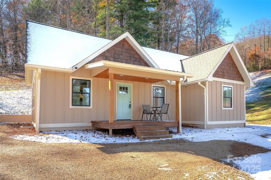 Beautiful Almost Brand New Home On 1 Acre!  3 Bedrooms, 2.5 Baths, 1466 Heated Square Feet (3rd Bedrooms 261 Square Foot is not counted in Heated Square Footage Because Of Ceiling Height), Large Living Room With Vaulted Ceiling & Laminate Hardwood Floors, Large Eat-In Kitchen With Butcher Block Countertops & Pantry, Large Primary Suite With Beamed Vaulted Ceiling & Ceiling Fan & Walk-In Closet & Ensuite, Open Loft With Ceiling Fan, Upstairs Bedroom Has Mini-Split, Large Covered Front Porch, Side Deck Off Primary Bedroom, Large Peagravel Patio, And Much More!  Minutes From Downtown Asheville & Shopping & Resturants.