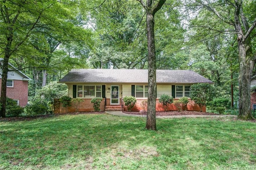 Stunning, Mid-century ranch with walk-out basement in sought-after Montclaire! Renovated throughout with addition of new full bath in master! Eat-in kitchen featuring all the extras including double ovens. New doors off kitchen lead to new 16x20 deck overlooking large trees! Beautifully finished hardwood floors and tile in all baths. Brand new water heater; HVAC only 15 months old; Roof only 5 yrs old. Huge rec room in basement is light and airy! On quiet street with garage. Don't miss this!