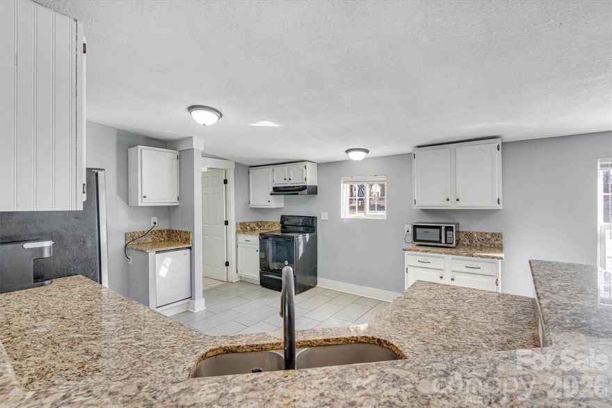 Micro farm, fenced back yard with quick access to Mooresville, Hickory or Charlotte.
Comfortable living space, 2021 roof replaced,2022 AC/Heat system replaced, newer windows & siding, provide you peace of mind when you purchase this home.
Inside tile and vinyl flooring offer a clean, modern look while making daily upkeep simple—ideal for busy lifestyles, pets, or effortless entertaining. Step outside to a fully fenced backyard divided in two sections, perfect for outdoor gatherings, playtime while still  letting pets roam freely  without getting in your space, the current owners have goats, chickens and more on the back fenced section not included in pictures.The inviting front porch adds a special touch, offering a quiet place to unwind and enjoy peaceful sunset views at the end of the day.
Located outside city limits, this home combines affordability with comfort—without sacrificing space or updates. If you’ve been waiting for a well-maintained home that allows you to settle in with confidence, this one deserves your attention.