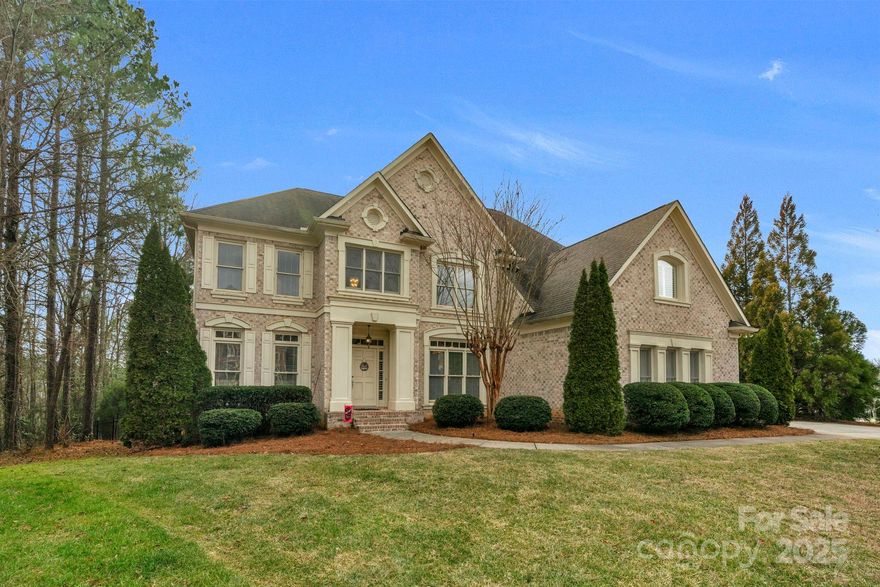 This approximately 4,105 square foot house features five bedrooms and four bathrooms and is situated on a cul-de-sac in the amenity rich Bridgemill Community. The high-quality John Wieland home has an open floor plan with recent updates including a custom stone fireplace in the Great room. The kitchen is complete with a center island, walk-in pantry, granite countertops, and breakfast area. Upstairs is an oversized owner's suit, spacious bonus room, additional bedrooms, and laundry room. This Home has the potential for a third-floor room, currently used as attic space conveniently located up a set of stairs. Step outside and enjoy the screened-in porch and patio. The home's exterior boasts a fully fenced-in backyard with mature trees. Featuring a three-car garage and oversized driveway. Residents of the Bridgemill community have access to a wealth of amenities, including two pools, three playgrounds, tennis, volleyball, & basketball courts, a pond, walking trails, and a clubhouse.