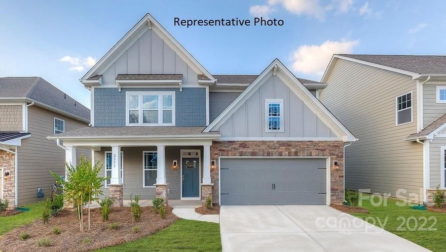 The Hampshire features an open floorplan with a spacious kitchen open to the family room plus first floor guest suite and drop zone at the garage entrance. Gourmet kitchen showcases kitchen island, gas cooktop, vented hood, with built in wall oven and microwave.   Just off the kitchen is a large walk in pantry and butler's pantry. The primary suite features a tray ceiling, sitting room and large walk-in closet. Community offers resort style amenities in sought after location, close to Ballantyne conveniences with low Lancaster County taxes! REPRESENTATIVE PHOTOS