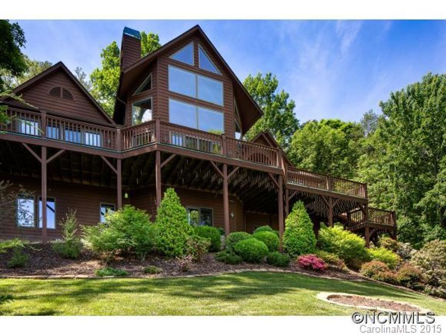 Gorgeous contemporary luxury mountain chalet in Reems Creek Golf Community. In-Law Suite with 2nd kitchen, bedroom, and office. Open floor plan with tongue and groove ceiling, built-in shelves throughout, 2 stone fireplaces, recessed lighting and built in surround system, termite bond transferable and copy of elevator maintenance on file. Motivated sellers!! Bring us an offer!