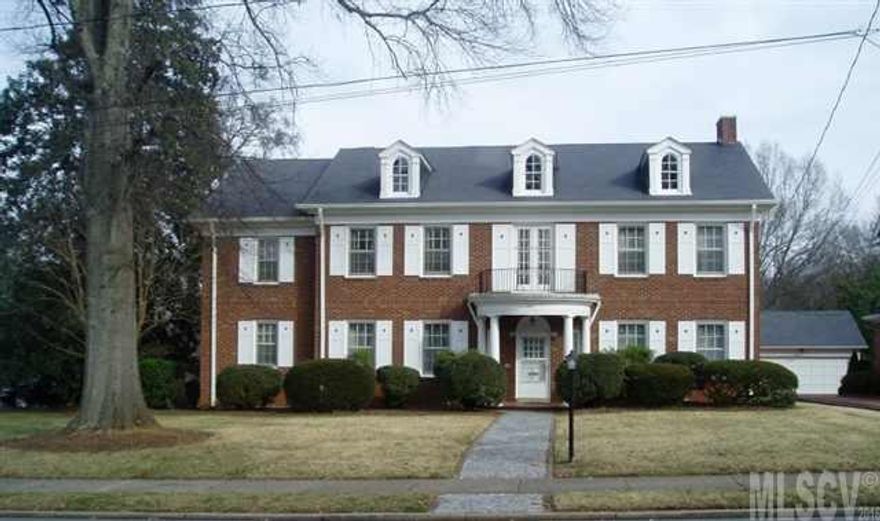 Historic Oakwood Home featuring all brick construction. Fully remodeled including new kitchen & baths, refinished hardwood floors & paint throughout. Simply charming.