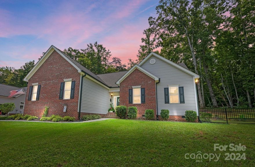 Welcome to your dream home! Discover comfort and tranquility w/NO HOA! This meticulously maintained 3BR, 2BA ranch home features a spacious layout, numerous upgrades and is move-in ready! Enjoy your open and airy great room including a cozy fireplace which seamlessly flows into the dining area and kitchen, creating a warm and welcoming atmosphere for gatherings.  The kitchen boasts SS appliances, granite countertops, under cabinet lighting & more! Your spacious primary BR features a walk-in closet, en-suite bath w/dual vanities, a soaking tub and a separate shower. Two additional bedrooms provide versatility for guests or home office. Outside, enjoy the charming screened-in back porch, beautifully landscaped backyard oasis featuring a large patio w/fire-pit and fenced-in yard perfect for year-round entertainment! Additionally, you’ll love the detached garage, providing plenty of space for a workshop, vehicle, hobbies, or additional storage!  This is a MUST SEE- Book your showing today!