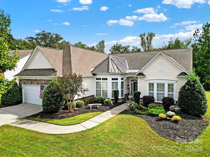 Stunning Cumberland Hall with screened in porch overlooking private wooded view! Open & entertaining chef's kitchen features granite counter tops, SS appliances, gas cooktop w/vent hood, wall oven, long center island, & a sunny breakfast nook! Cozy up to the gas-log fireplace in the great room during cooler months & enjoy the beautiful views from the tiled screened in porch with ceiling fans for added comfort on warm days! Spacious primary suite offers a tray ceiling & ensuite bath w/soaking tub, dual sink vanity, glass shower, & a walk-in closet! Two generous guest bedrooms w/Jack-and-Jill bathroom are perfect for overnight guests. Office/den with French doors sits at the front of the home - ideal for a home library, office or hobby room! Plantation shutters & custom lighting  throughout home, A/C-2016, Furnace-2021, Water Heater-2022. Don't miss Sun City's golf course, resort style amenities, social clubs, & more. Just minutes to dining, shopping, & entertainment! Plus low SC Taxes!