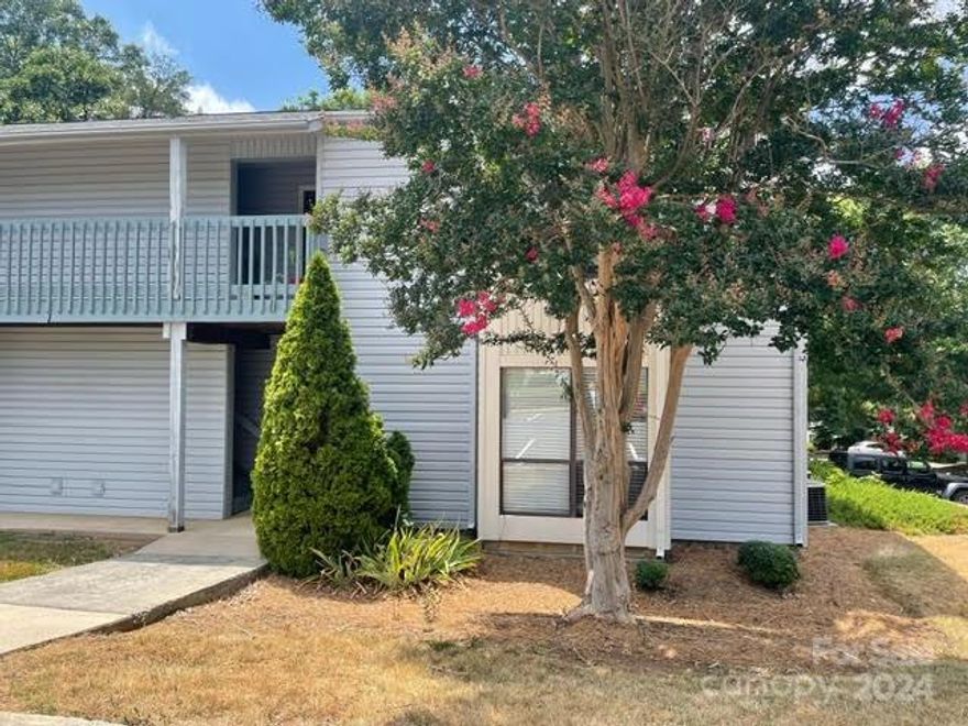 Cozy and clean 1 bedroom 1 bath main level end unit condo minutes from Ballantyne and I-485.  Features include granite counter tops in kitchen, dining area, wood burning fireplace in family room, all appliances included, spacious primary bedroom with walk-in closet, community pool and green space, water and sewer included in HOA dues, easy access on main level, located in the heart of South Charlotte surrounded by retail and restaurants.