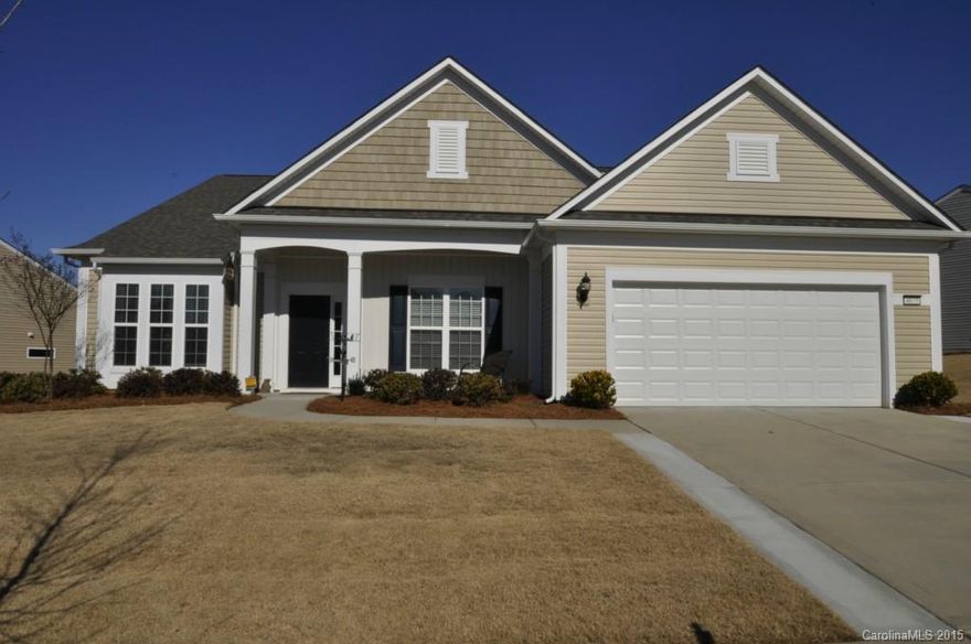 WOW factor here!  Home has all the upgrades and extras possible.  Formal Dining Room, Office, Butler's Pantry, Built in Mud Room Storage, Granite countertops, Center island, Bar seating, Upgraded cabinets and moldings, All upgraded built in Kitchen Aid SS appliances, Hardwoods throughout, Tile Baths, 3 beds, 3.5 baths, Custom Master bath with raised vanities, Extra seating area w/vanity, Tile shower, HUGE walk in closet with custom built ins, Nice screened in Lanai, all this with tons of charm!