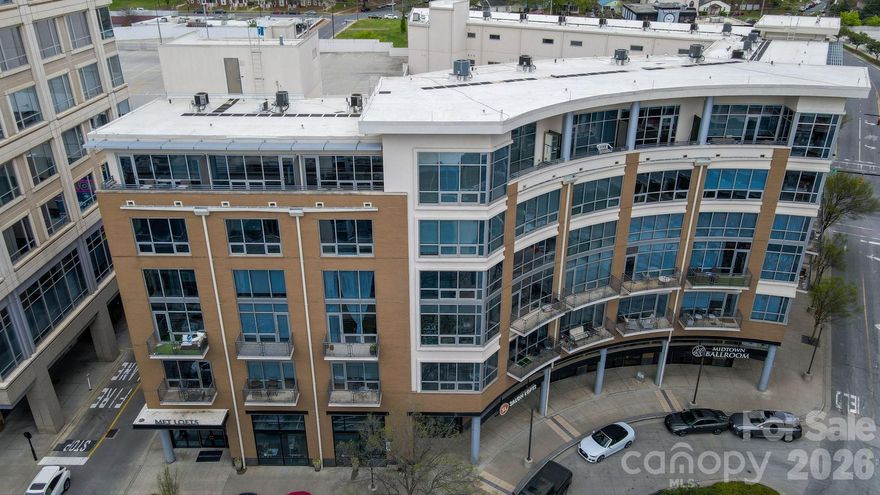 Welcome to Met Lofts at The Metropolitan! Where skyline views and walkable city living come together. This sixth-floor, two-level condo offers sweeping Uptown views and a bright, open layout. 
The main level features a spacious kitchen with abundant cabinetry, a dining area, comfortable living space, and a convenient powder room. Downstairs, you’ll find two well-appointed bedrooms—each with walk-in closets and private en-suite baths—plus a centrally located laundry closet for added convenience.
Enjoy immediate access to dining and shopping right downstairs, along with premium amenities including covered parking (with a space near the entry), a dedicated storage unit, and a clubhouse featuring a pool, fitness center, grilling area, and ample seating.  All this, Located right beside the 17+ mile Little Sugar Creek Greenway. 
Learn more: https://MetropolitanClt.com