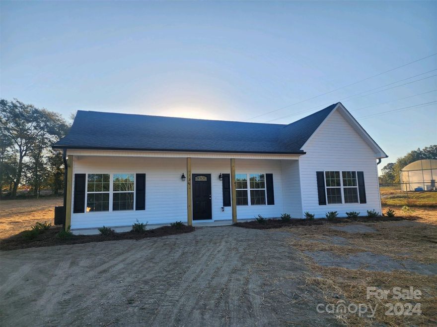 There is no wasted space in this adorable, 3 bedroom, 2 bathroom, proposed to be built floorplan, located on a .84 acre lot. The split bedroom plan affords privacy for the primary bedroom/bathroom, that features double vanity and walk in closet.  The other two bedrooms have easy access to the full hall bathroom.  The eat in kitchen, features granite counters, wood cabinets, SS appliances and is open to the living room with vaulted ceiling.  If you are looking for proposed new construction, outside the city limits of Pageland, this one may be for you!