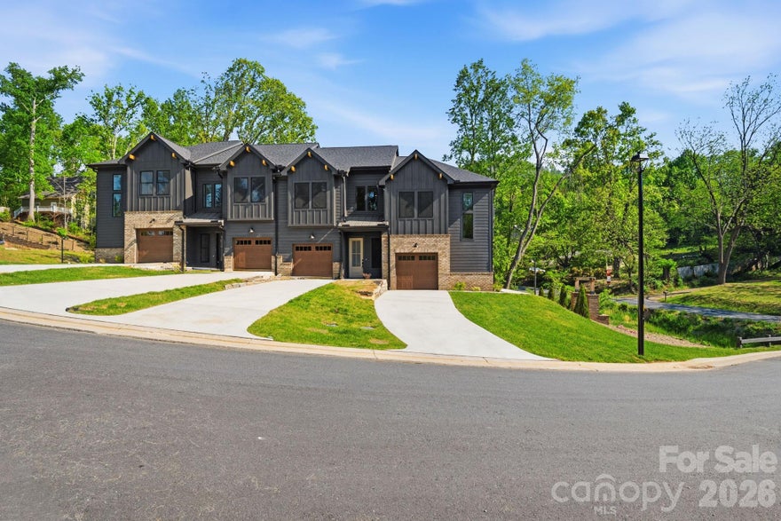 Newly completed townhome in desirable Villas at Pinecroft.  This 41 unit townhome community is nestled in the heart of the gorgeous Beaverdam Valley.  Close proximity to shopping, grocery and restaurants.  3 miles from Beaver Lake and the Bird Sanctuary, easy access to the Blue Ridge Parkway and 2.5 miles to the Country Club of Asheville.  This new townhome features quartz tops, pre-finished HW flooring throughout the main level, SS appliances, private covered back deck, 10' ceilings on the main level and 9' ceilings on the upper level.  Large primary BR suite with double vanity, tile surround shower and large walk-in closet.  Single car garage and driveway for additional parking, tankless water heater and more!  City water and sewer, natural gas and underground utilities appoint the community.