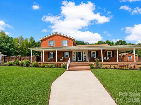 Photo of 907 Sikes Mill Road, Monroe, NC 28110 (MLS # 4412371)