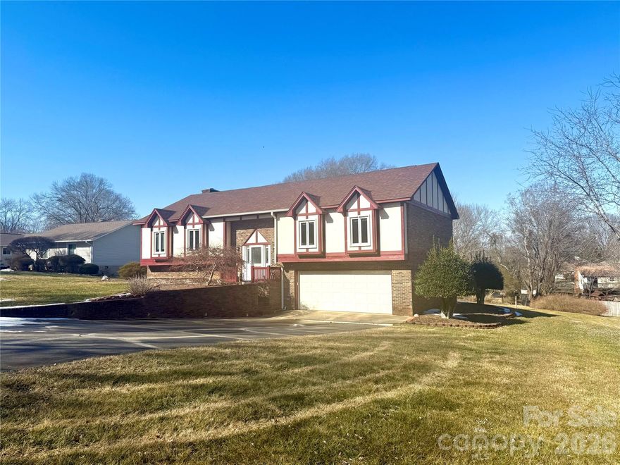 Spacious well-maintained home in the beautiful, established neighborhood of Falling Creek!  Wonderful floor plan with large rooms, den area with stone fireplace, leads to cozy sunroom and screened porch area overlooking a large backyard. There are many nice roll out windows throughout which offers abundant natural lighting. Primary on main with good closet space and private bath. Oversized rec room in walk out basement with fireplace, full bath, laundry room with sink and a huge garage for parking and storage.  This house has great bones and tremendous potential!