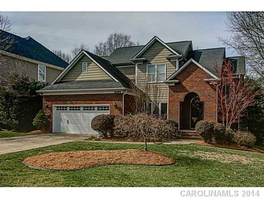 Beautiful custom built home by community builder, open floor plan with many upgrades. Hardwoods on 1st floor and stairs. Dramatic open foyer. Crown molding and chair walls throughout main floor. Surround system indoors/outdoors, custom tile on fireplace, custom tile back splash in Kitchen.in ground irrigation, security system, built in gas line grill, large walk in attic, can  be finished.