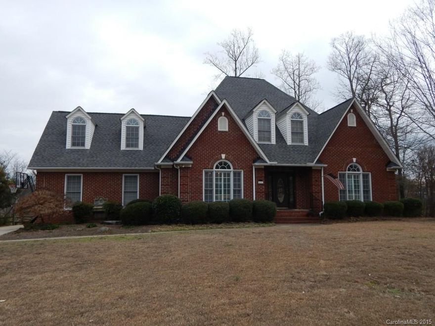 This spacious, all brick home has an open floor plan and offers tons of space.  Updated kitchen has stainless appliances, granite counters, and tile backsplash.  Enjoy views of the pond from the living room or breakfast area.  There's also formal dining, office area, and butler's pantry.  4 bedrooms plus a bonus room and tons of storage in walk out attic spaces.  2 car attached, side load garage, brick patio, fenced yard, & a pond.