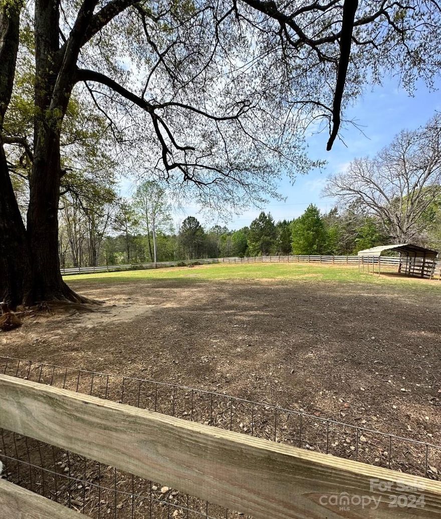 Price Improvement! Introducing a quaint countryside retreat nestled on 4 acres. The home boasts contemporary comfort & rustic allure. Built in 2021, home features 2 Beds, plus a 3rd area used as a guest area/office. 1 full BA w/custom tile shower. The home is designed w/a very open concept kitchen & family room, fostering a seamless flow for everyday living & entertaining. A welcoming front porch invites relaxation, while covered patio/sitting area spanning 24x20, complemented by an addt'l open patio provides space for outdoor gatherings. Deck extends the living space outdoors & around the above ground pool. For those w/an affinity for equestrian pursuits the property includes a fenced-in pasture, run in area for horses, chicken coop and red barn from early 1900’s.There is a 1 car detached garage repurposed as horse stall & dog pen, complete w/storage. The property is private, surrounded by trees & offers stunning natural views. Property is being sold to include all 4 parcels together.