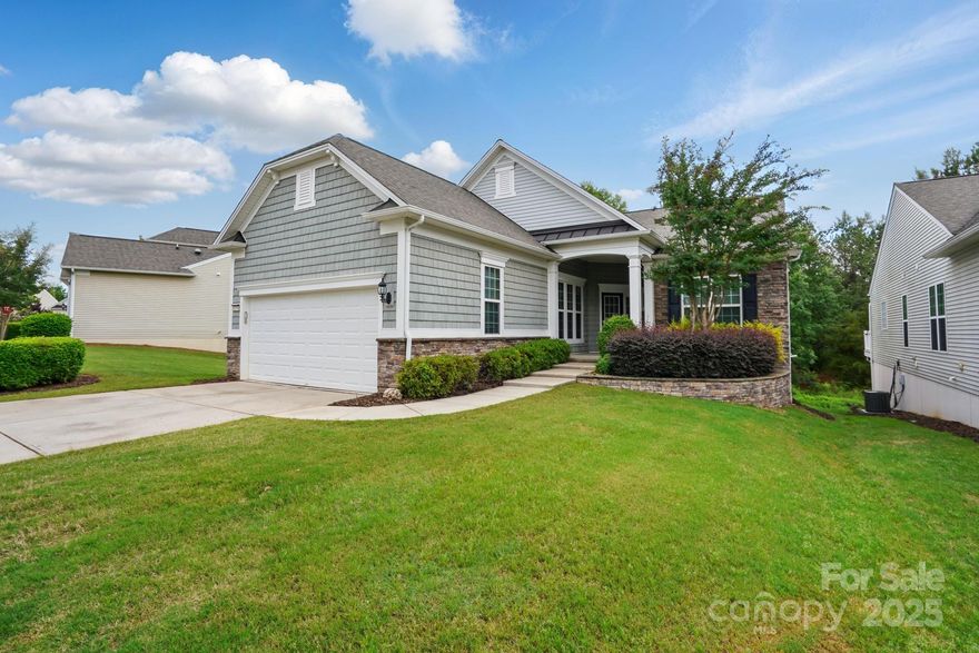 Move-in Ready! BEAUTIFUL Surrey Crest home w/Sunroom on fully finished walk-out basement, overlooking private trees & partial lake view. Home has been freshly painted, cleaned & new carpeting in bedrooms & basement. Pristine wood flooring flows thru all main living areas. Gourmet kitchen features granite countertops, rollout cabinet drawers, tile backsplash, kitchen island, eat-in breakfast nook & breakfast bar w/picture window overlooking main living area. Fridge & washer/dryer to convey. Generous living room w/built-in shelving, french doors leading to office/hobby room, & sunroom overlooking private wooded oasis. Nice size deck off back of home, perfect for grilling & enjoying nature. Spacious primary suite w/tray ceiling, walk-in closet, ensuite bath w/granite double sink vanity, walk-in shower & garden tub. Guest BR sits at front of home w/hall bath. Basement w/guest bedroom, bath, office, large bonus room, perfect for guests. STORAGE! 55+ golf community & resort style amenities.