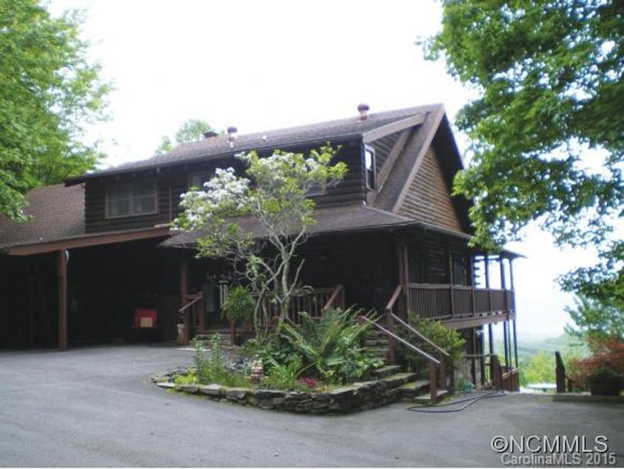 Lovely mountain retreat on 4.7+/- acres less than 3 miles from downtown Brevard with magnificent views. Gorgeous stone fireplaces and an in-law suite with both interior and exterior entrances. Wrap-around decks and garden spot. Too many features to list. A must see. Property includes 6 parcels.